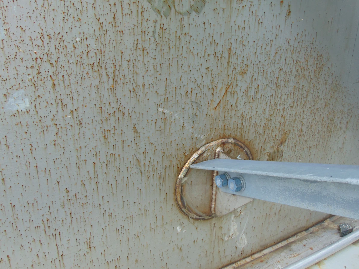 Figure 10.Lack of passivation treatment led to pitting corrosion at embedded iron from grinding during fabrication. 