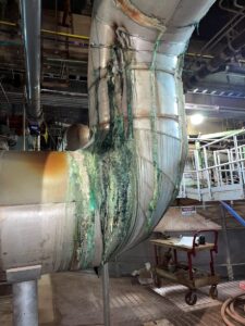 Figure 2. Corrosion and leaks in piping between quencher and scrubber.