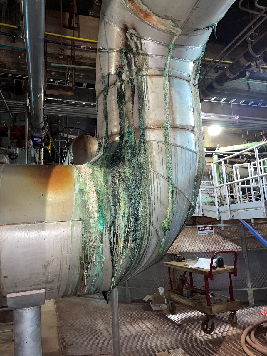 Figure 2. Corrosion and leaks in piping between quencher and scrubber.